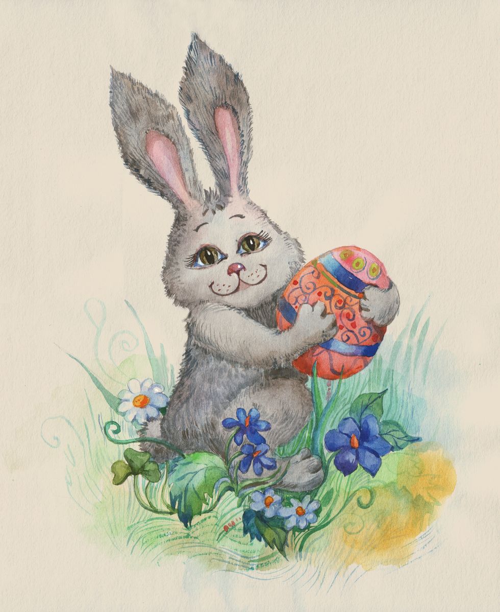 easter rabbit with egg drawn by a water color on a beige paper
