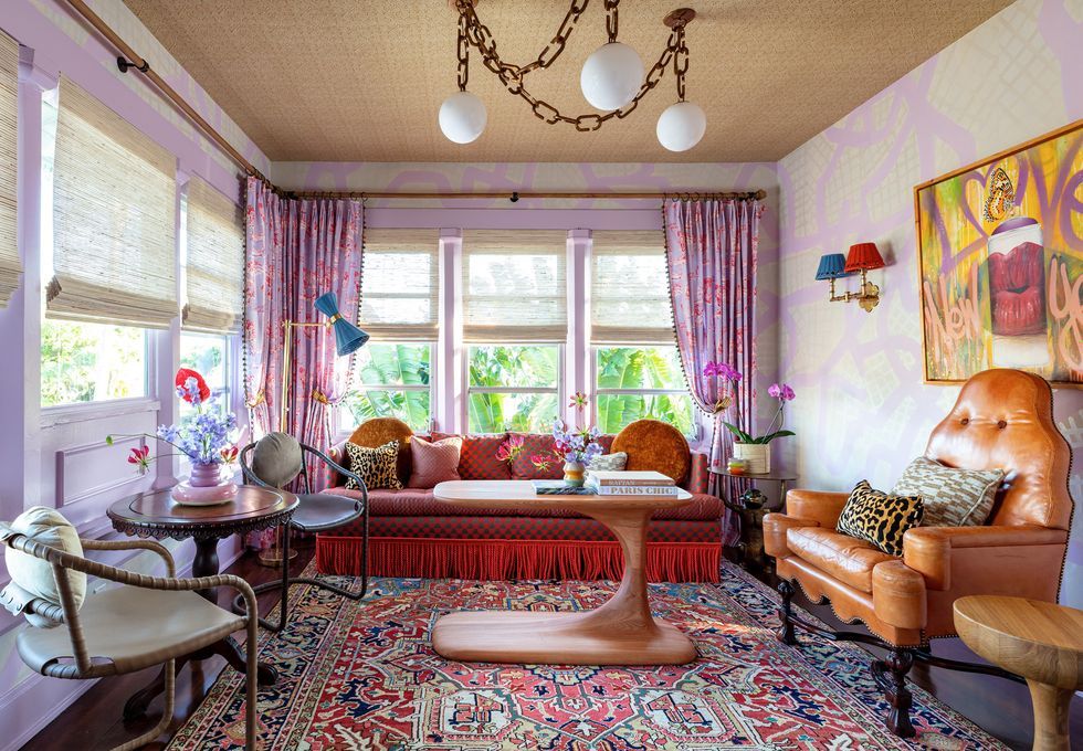 https://hips.hearstapps.com/hmg-prod/images/colorful-comfort-veranda-small-living-room-ideas-1658777735.jpeg