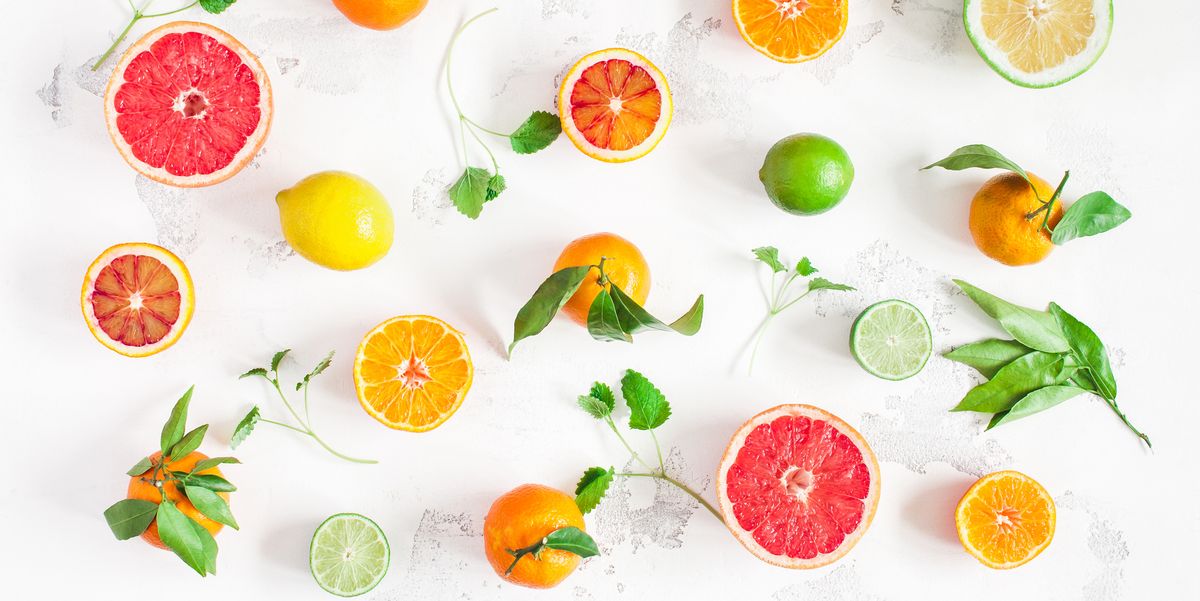 Colorful fresh fruits on white bacground. Flat lay, top view
