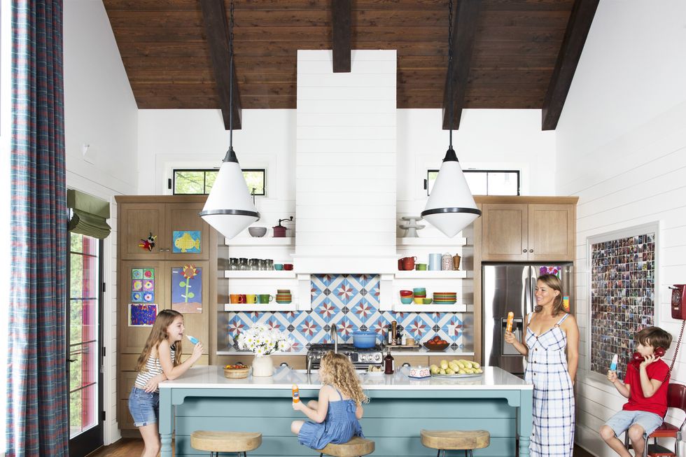 colorful galley kitchen with big island, michigan