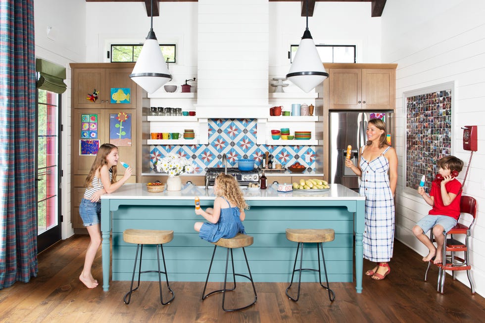 colorful galley kitchen with big island, michigan