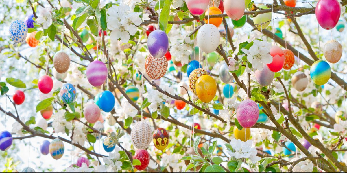 colorful handmade eastereggs on an apple tree