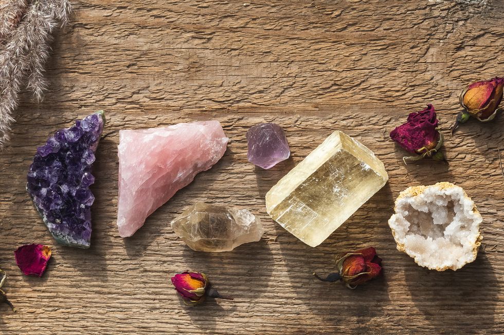 colorful healing crystals and minerals in a row