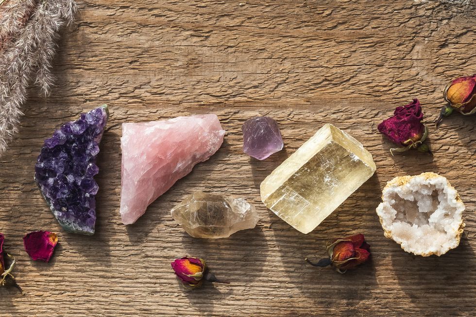colorful healing crystals and minerals in a row