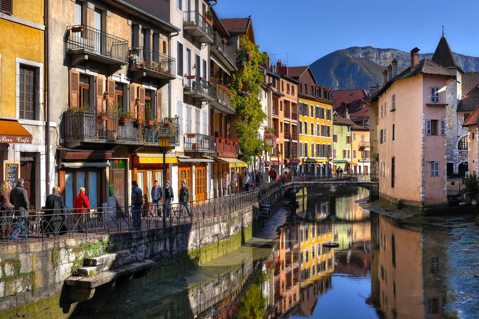 colorful houses along canal in annecy