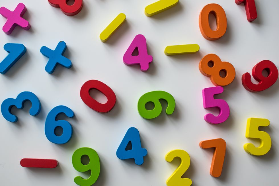 colorful pile of numbers in a white background