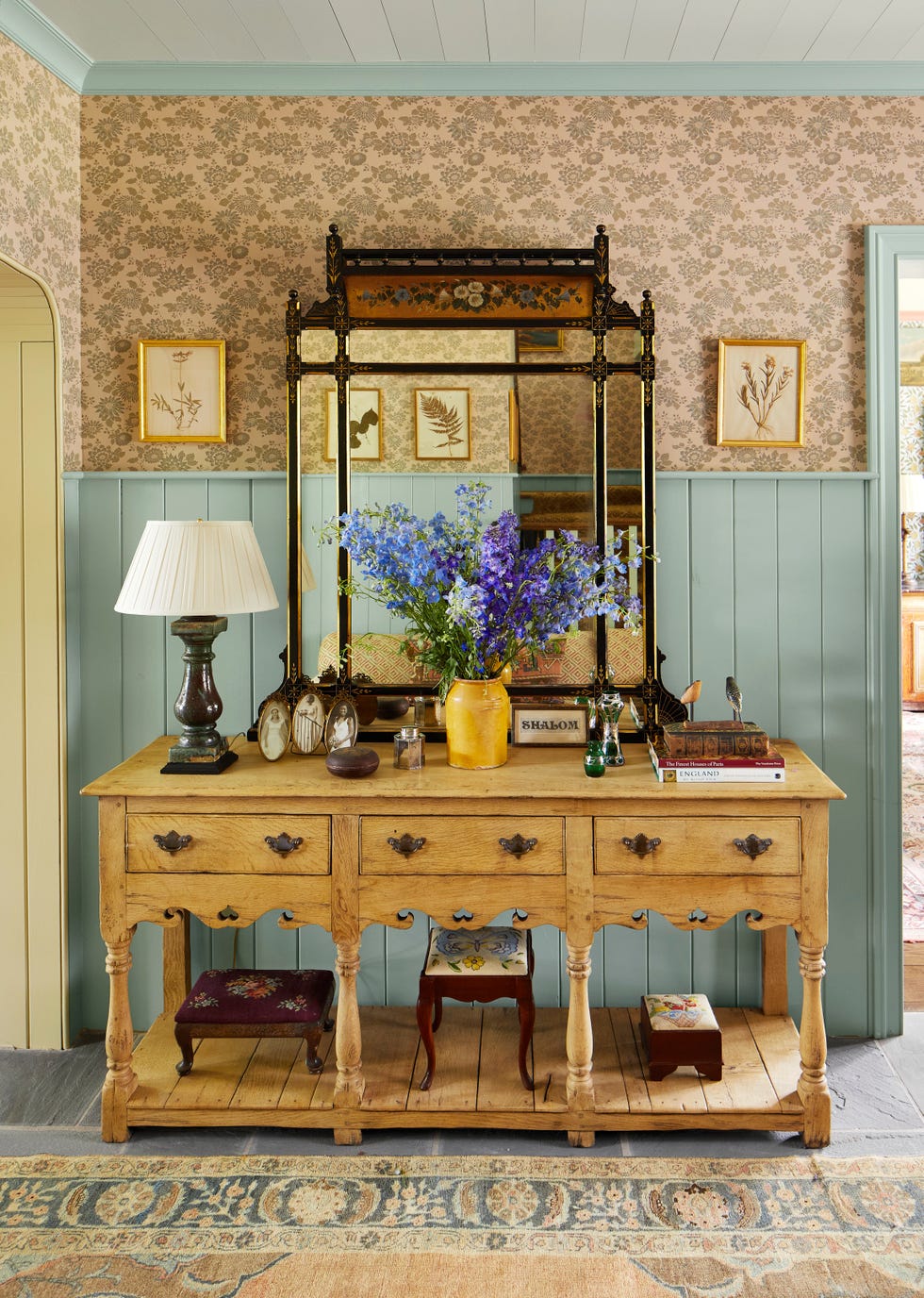 entry with soft blue wainscotting