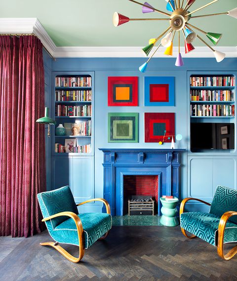 modern living room with blue, green, and red decor