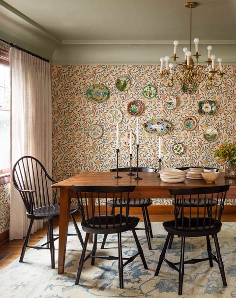 dining room with plate gallery wall and wallpaper