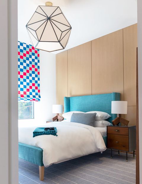 contemporary bedroom with turquoise frame