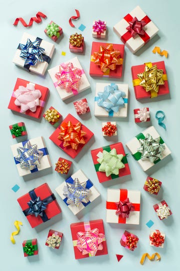 colourful gift boxes on light blue background pattern