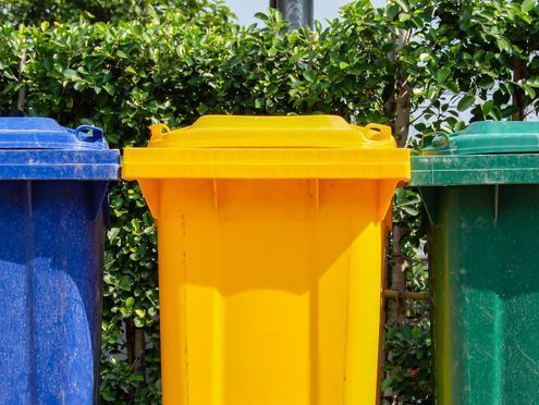 colourful plastic bins for different waste types