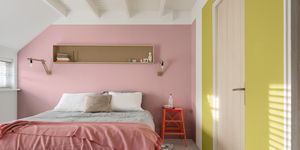 Colourful small bedroom with pink ad lime green walls