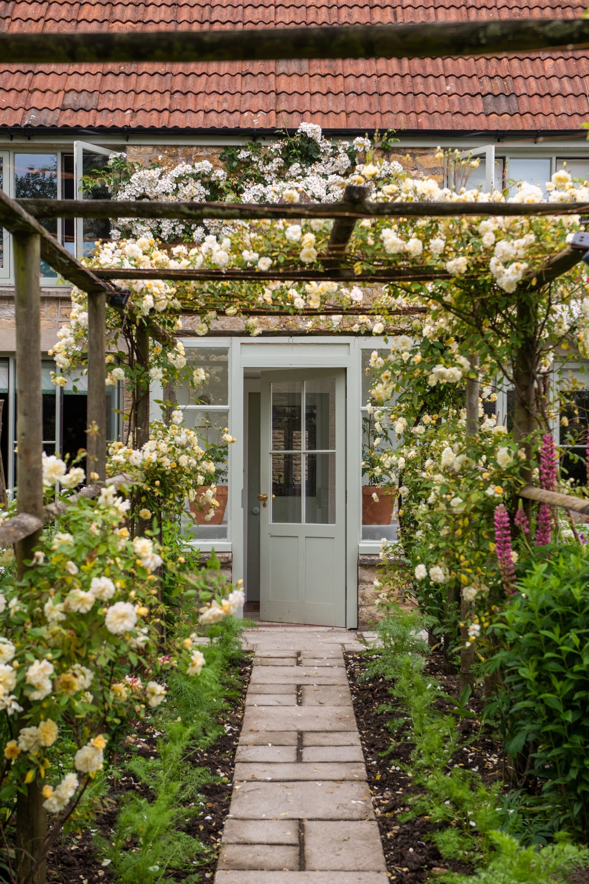 Step inside an upholsterer's joyfully decorated cottage in Somerset