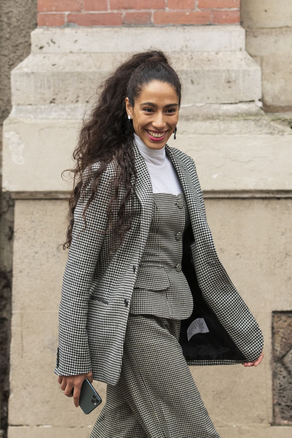 paris, france   march 03 digital influencer julia comil wears a nanushka jumpsuit, victoria beckham shirt, longchamp hair scarf on march 03, 2020 in paris, france photo by kirstin sinclairgetty images
