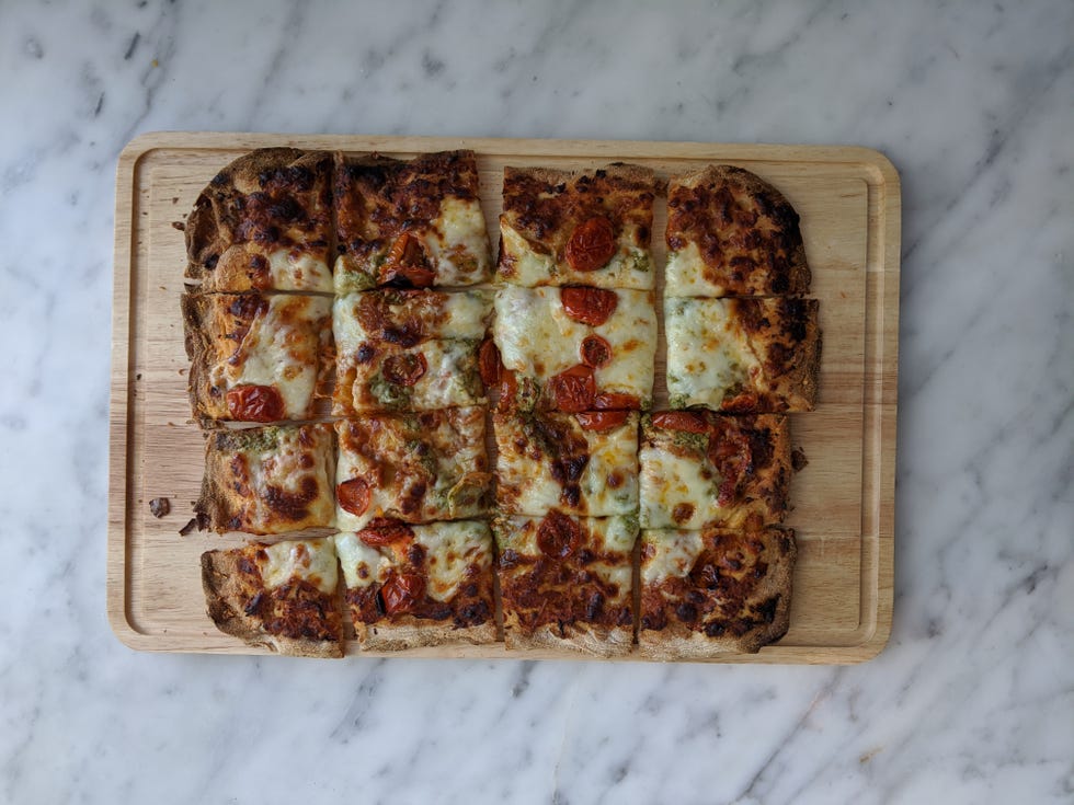 costco take and bake combo pizza baked and cut into squares