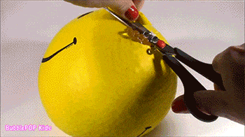 This Smiley Face Squish Ball Being Popped and Gutted Is Peak 2016 Internet