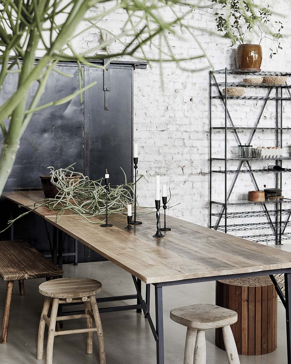modern industrial style dining room with wooden table and metal legs