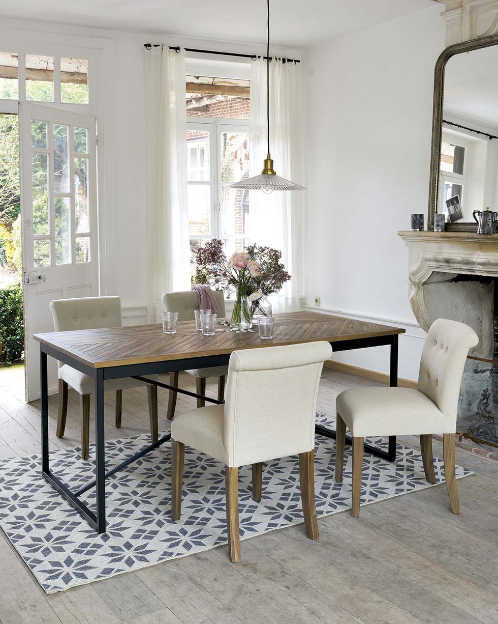 Contemporary and elegant classic dining room with white upholstered chairs