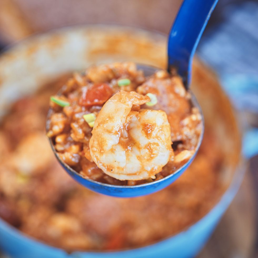 comfort food cajun style chicken, shrimp and sausage jambalaya in a cast iron pot