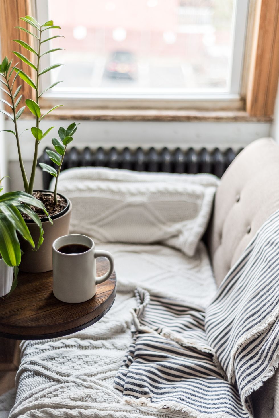 a comfortable sofa with coffee in a cozy home