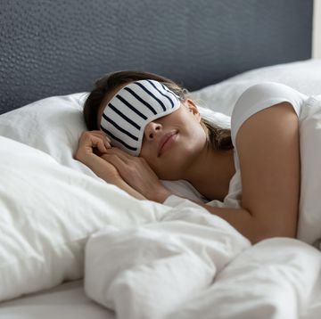 comfy sleeping mask helping young woman enjoy good healthy sleep