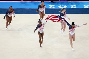 a group of women ice skating