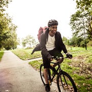 cycling tips for beginners Commuter cycling in the park going at work in London