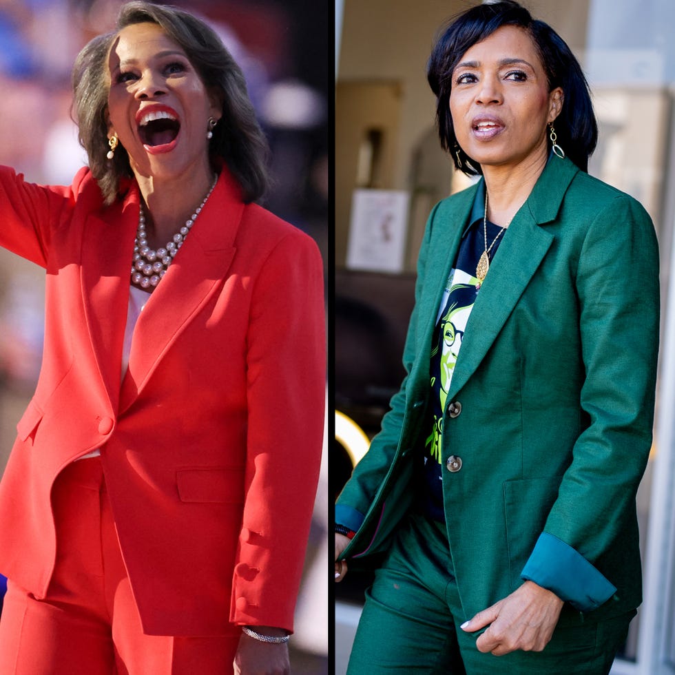 two women in colorful suits one in red and one in green