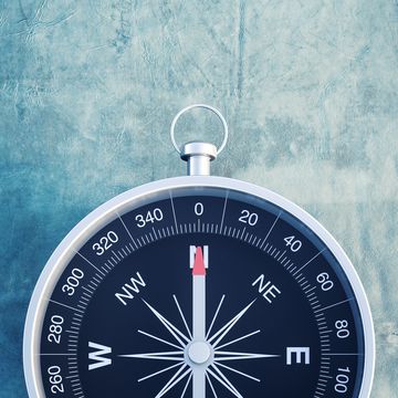 compass on blue background