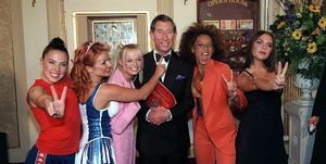 manchester, united kingdom may 09 prince charles with the spice girls at the manchester opera house for a royal gala performance to celebrate the 21st anniversary of the princes trust charity l to r singers melanie chisholm sporty spice, geri halliwell ginger spice, emma bunton baby spice, melanie brown scary spice and victoria beckham posh spice photo by tim graham picture librarygetty images