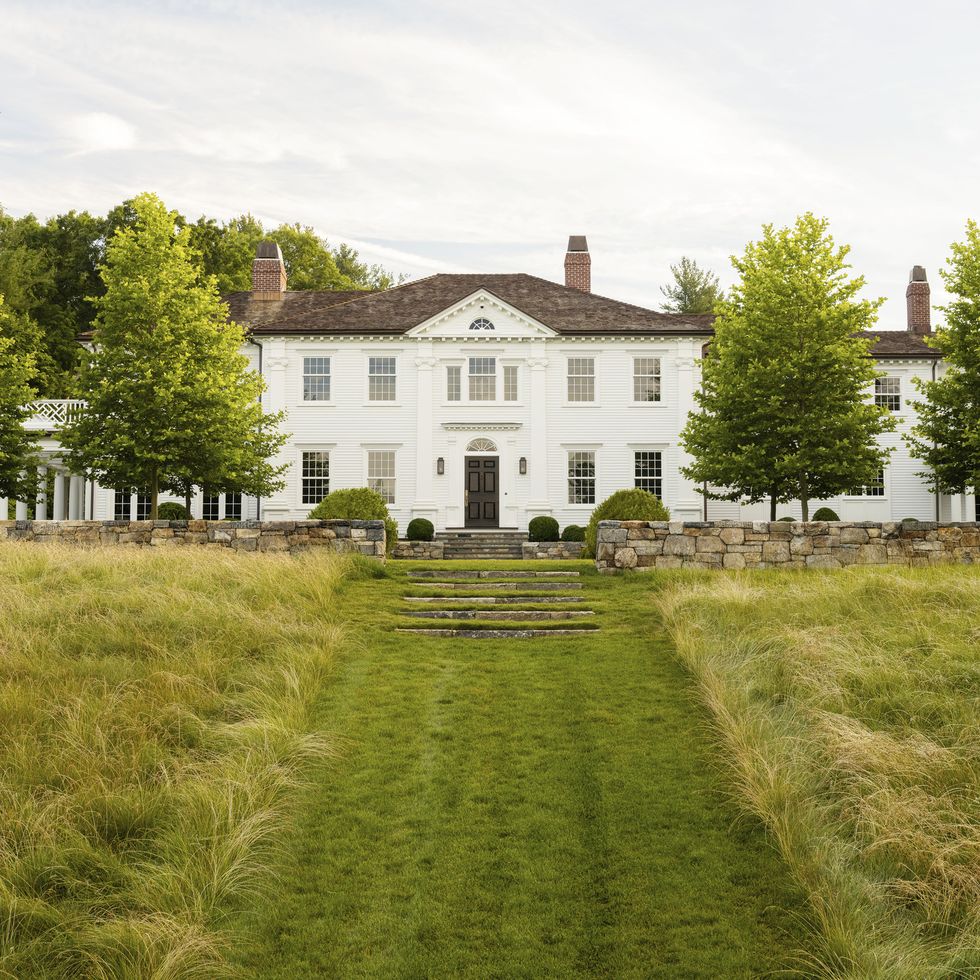 home in concord, massachusetts design by dan gordon landscape architects meadow grasses invite a soft transition from the stately entrance to the rural concord surrounds