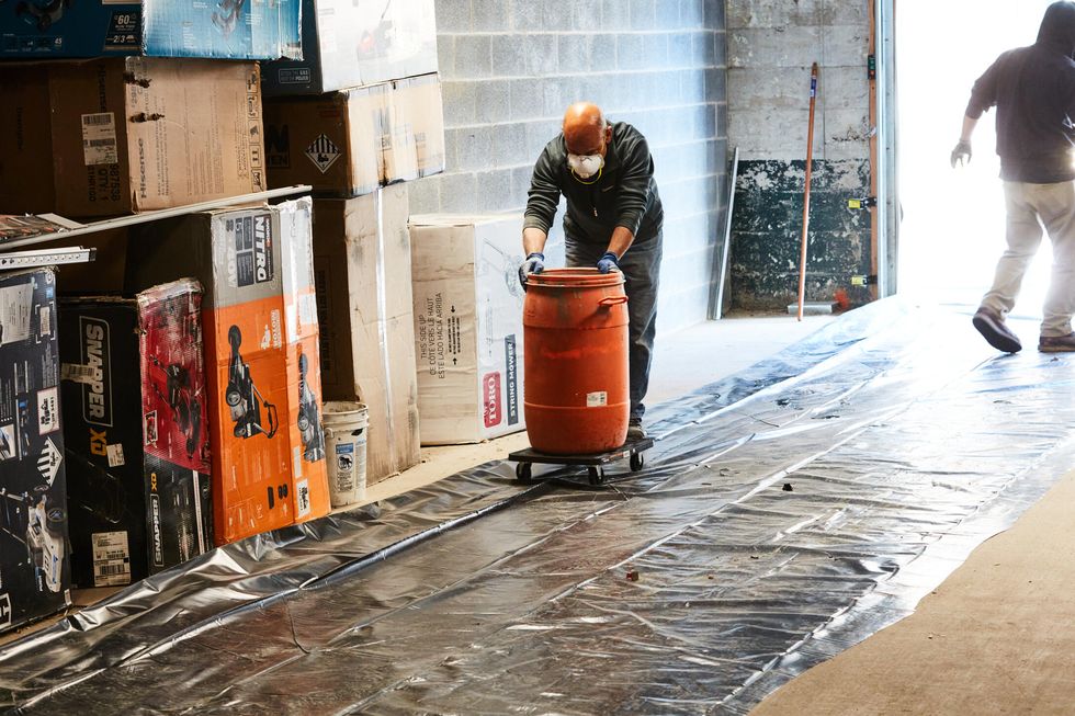 concrete floor leveling process in the popmech basement