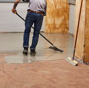 concrete floor leveling process in the popmech basement