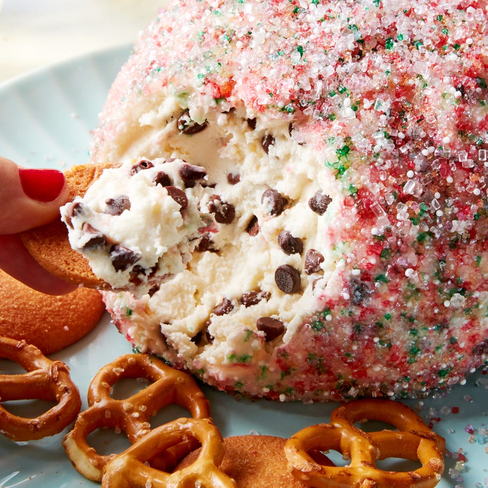 chocolate chip cookie dough ball rolled in sprinkles served with pretzels and nilla wafers