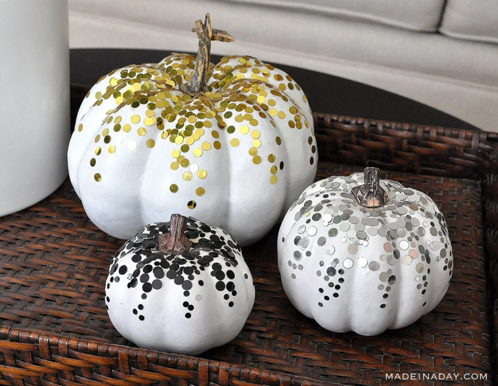 a couple of decorated pumpkins