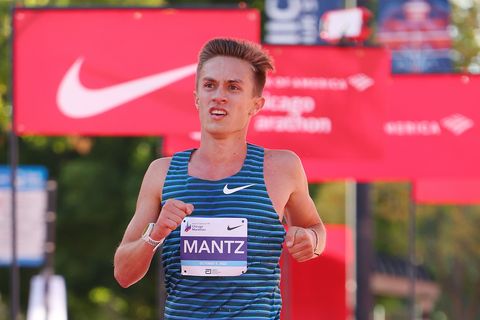 chicago, illinois   october 09 conner mantz of the united states crosses the finish line to finish in seventh place in the 2022 chicago marathon at grant park on october 09, 2022 in chicago, illinois photo by michael reavesgetty images