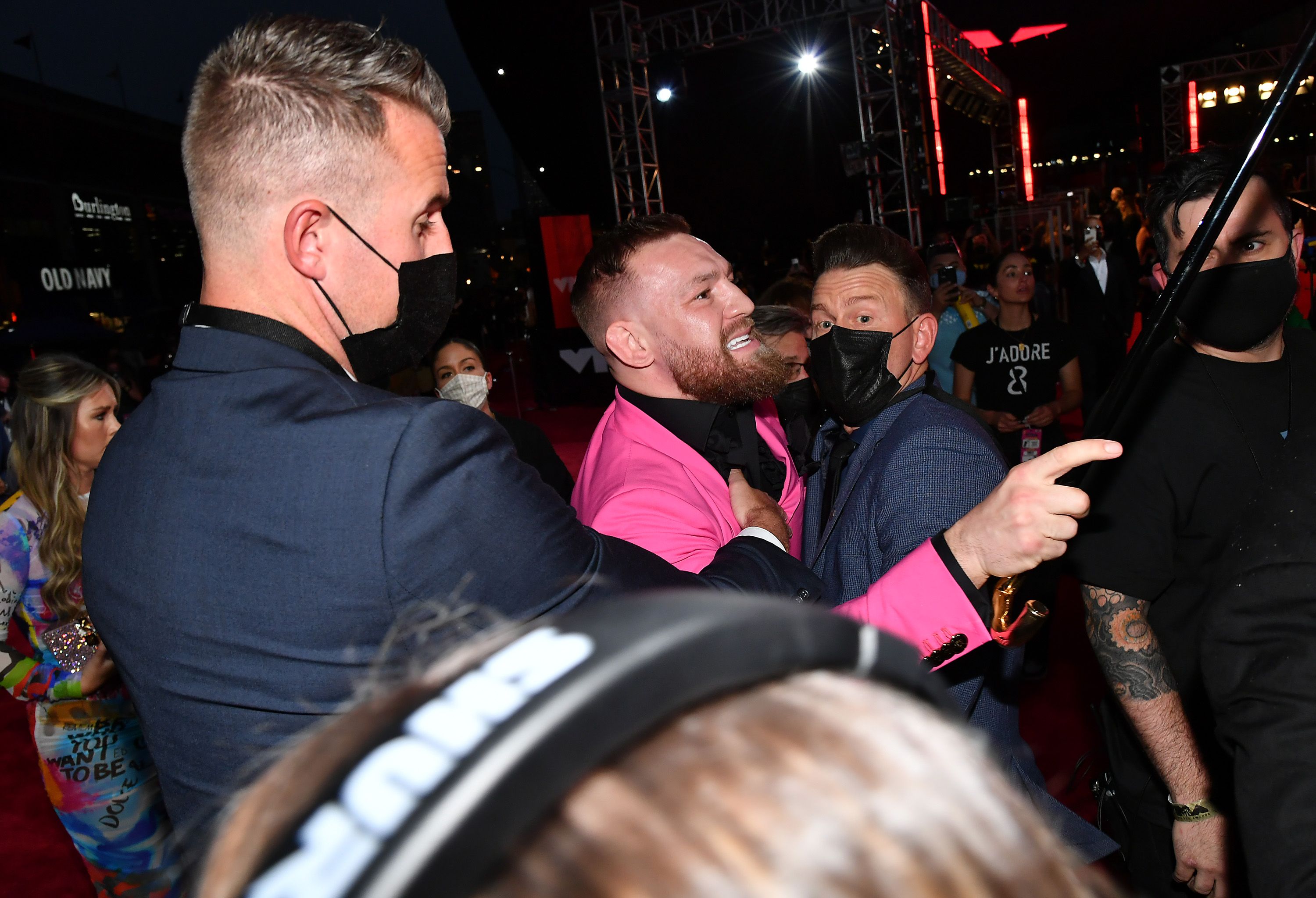Conor McGregor knocks back shots in a tux at party in West Hollywood amid  Machine Gun Kelly drama