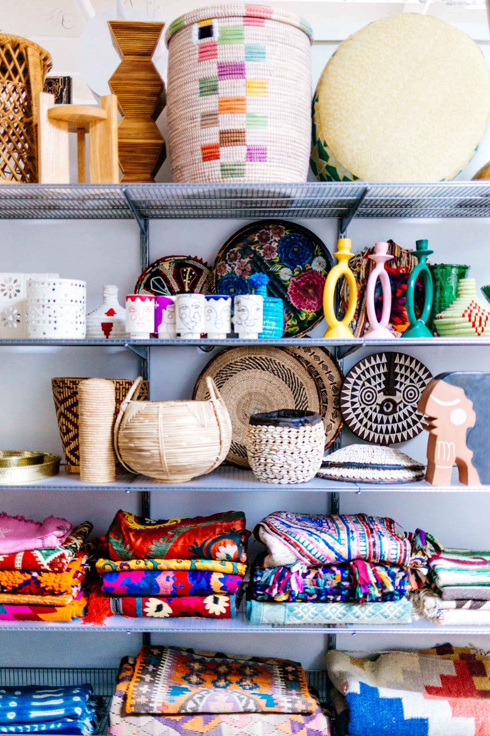 Props are organized on open shelves.