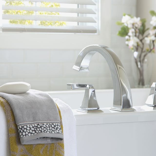 Contemporary bathtub and towels