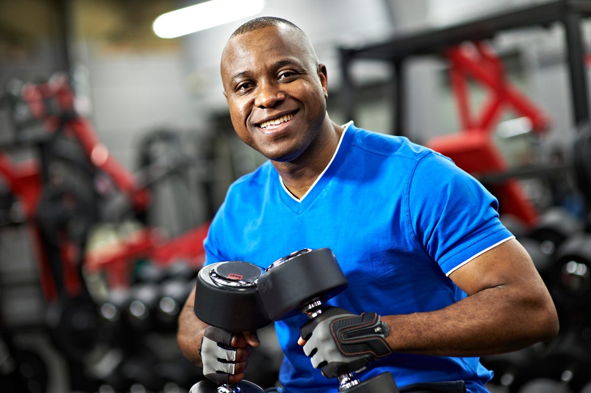 https://hips.hearstapps.com/hmg-prod/images/content-black-male-holding-weights-in-gym-royalty-free-image-1611089193.?crop=1xw:0.84494xh;center,top&resize=1200:*