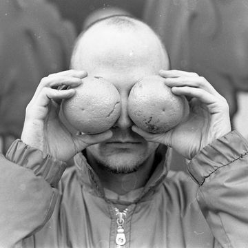 american musician, dj, record producer, singer, songwriter, and photographer moby, portrait, holding fruit over his eyes, in east village, new york , united states, 1995 photo by martyn goodacregetty images