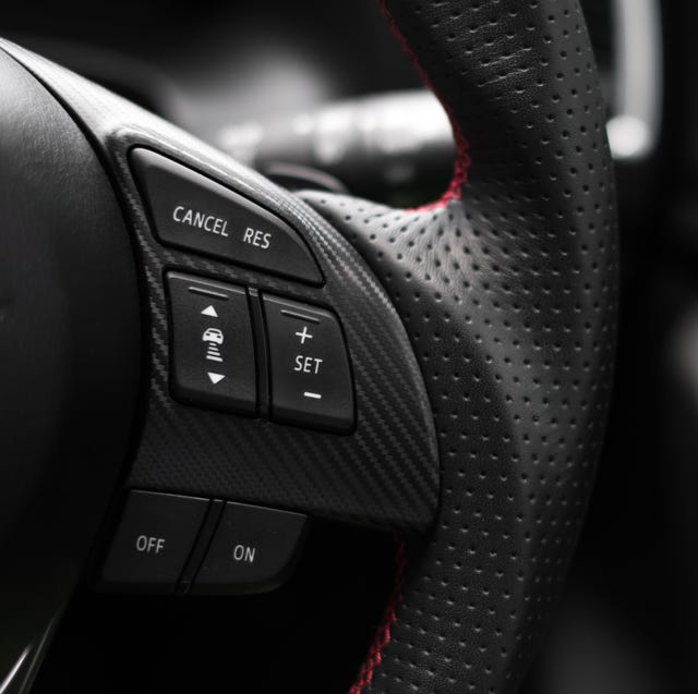 control buttons on steering wheel in a modern car