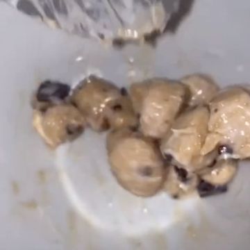little cookie dough pieces and what they look like when they are baked into one cookie