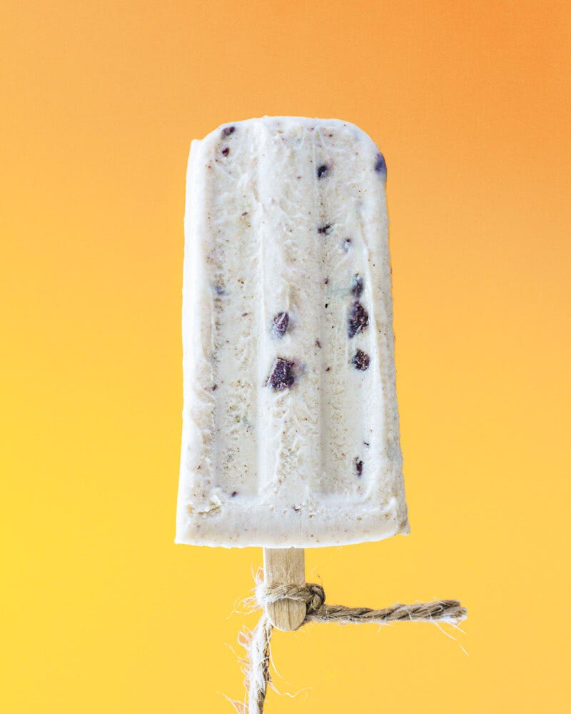 popsicle on orange background