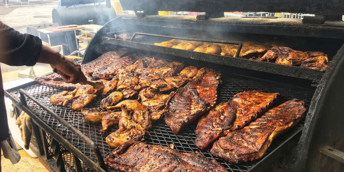 https://hips.hearstapps.com/hmg-prod/images/cooking-chicken-and-slabs-of-ribs-on-barbecue-grill-royalty-free-image-1625609727.jpg?crop=1xw:0.72245xh;center,top&resize=1200:*