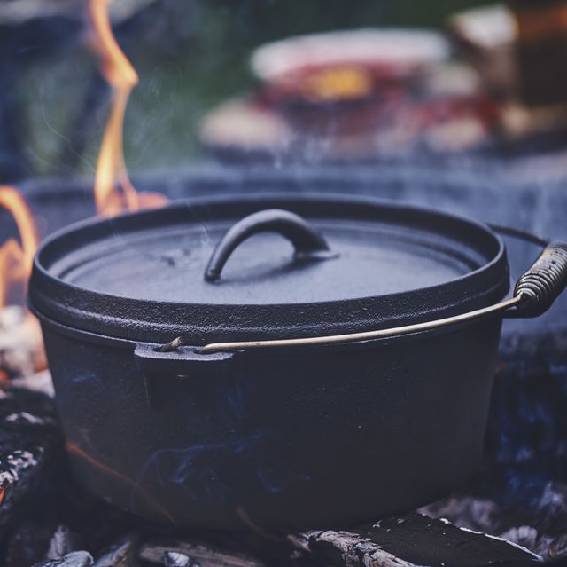 https://hips.hearstapps.com/hmg-prod/images/cooking-chili-con-carne-in-dutch-oven-over-logfire-royalty-free-image-1621014124.?crop=0.668xw:1.00xh;0.332xw,0&resize=640:*