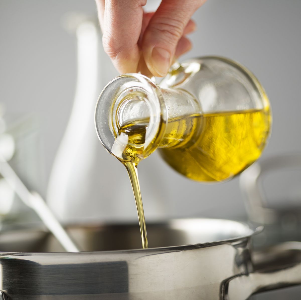 cooking meal in a pot with olive oil