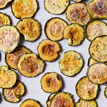 thinly sliced and baked zucchini rounds with cool ranch seasoning