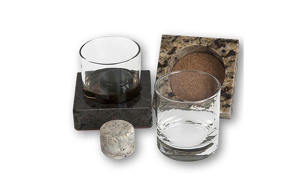 Old Fashon Glass Next To Bottle With Scotch Whiskey Stones Funnel